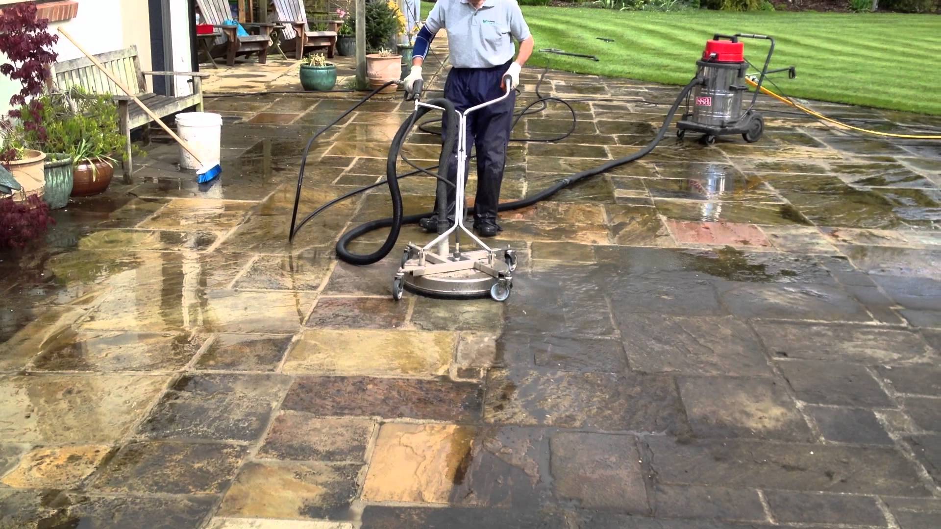 Natural Stone Patio being cleaned as part of routine ongoing maintenance of natural stone